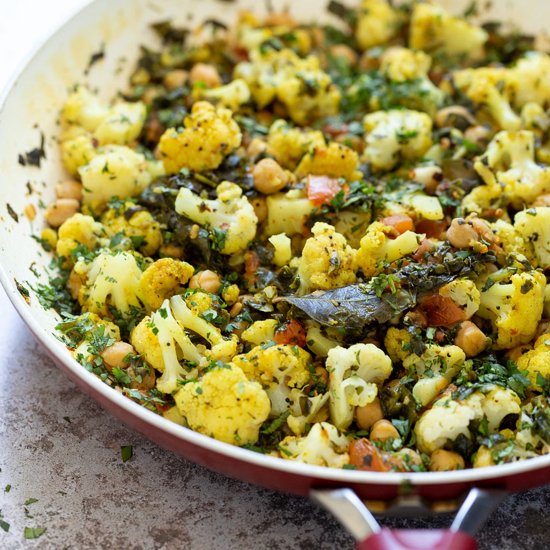 Cauliflower Chickpeas and Spinach in Mustard seed Curry Leaf Sauce