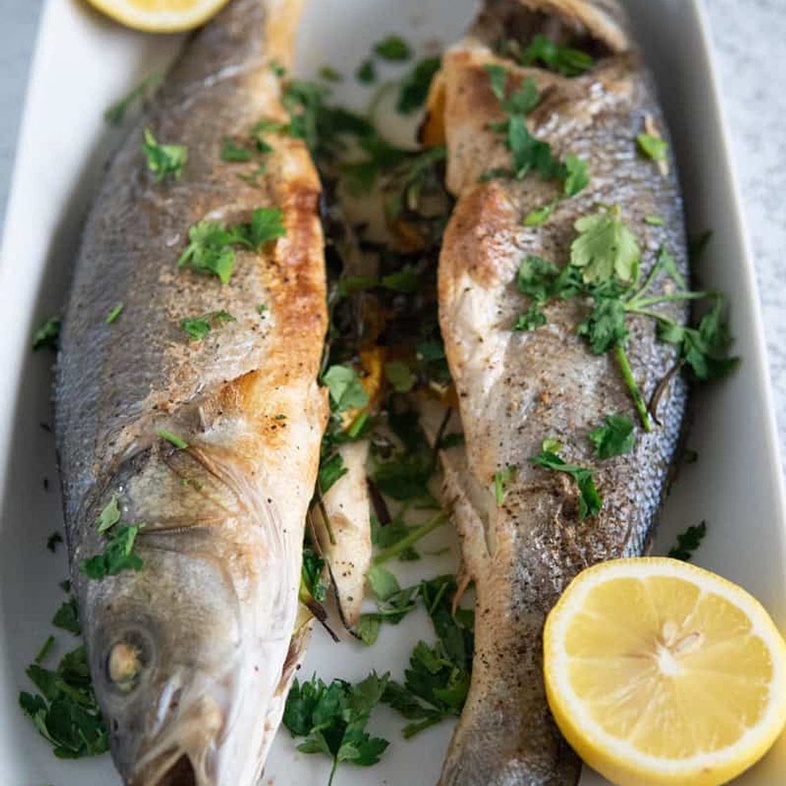 whole roasted branzino with lemon and fresh herbs