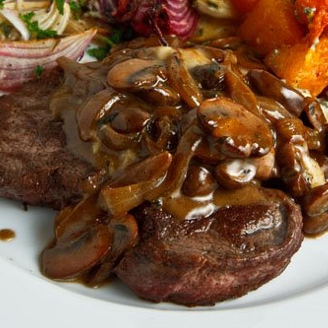 Steak Tenderloin in a Mushroom and Blue Cheese Sauce