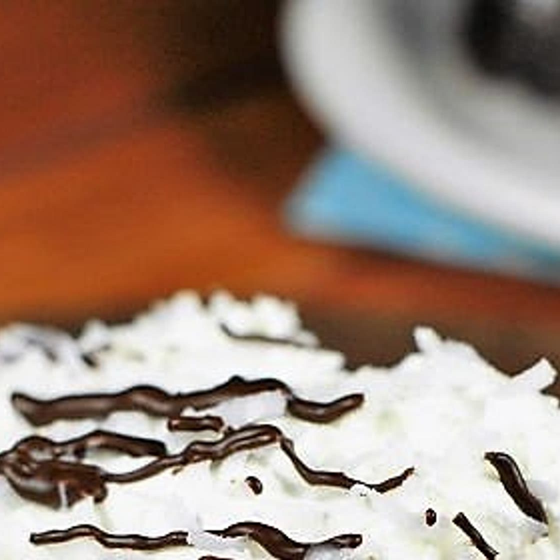 Coconut Chocolate Poke Cake {with Coconut Whipped Cream Frosting}