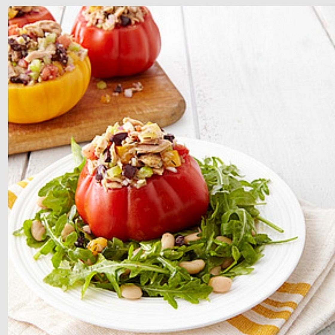 TUNA SALAD-STUFFED TOMATOES WITH ARUGULA
