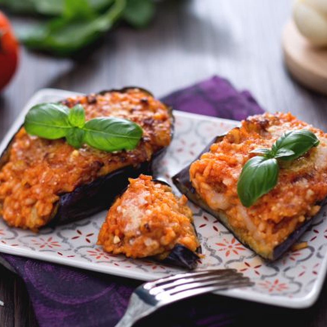 Melanzane ripiene di riso con cuore filante