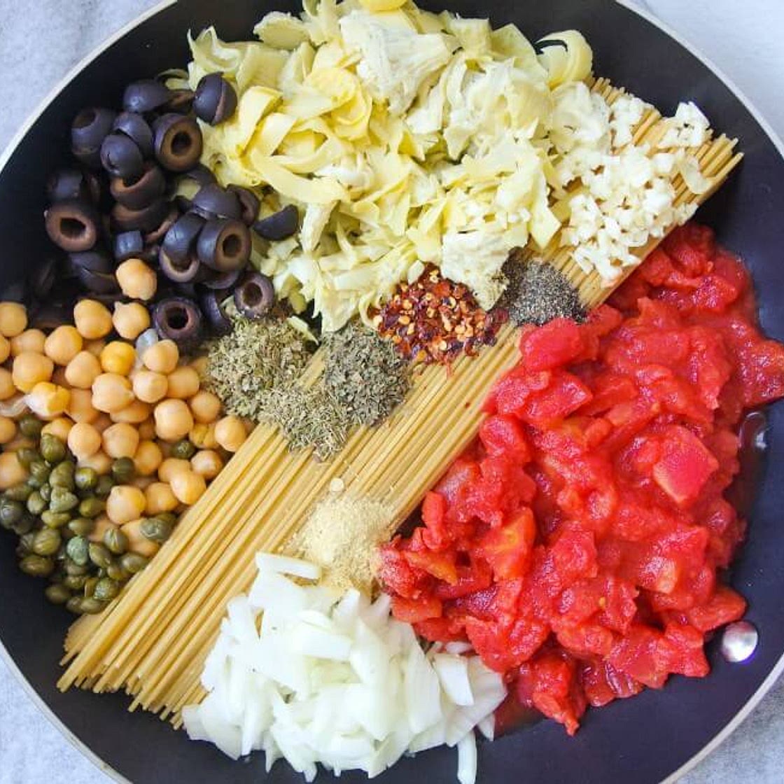 One Pot Spaghetti Alla Puttanesca with Chickpeas & Artichoke Hearts