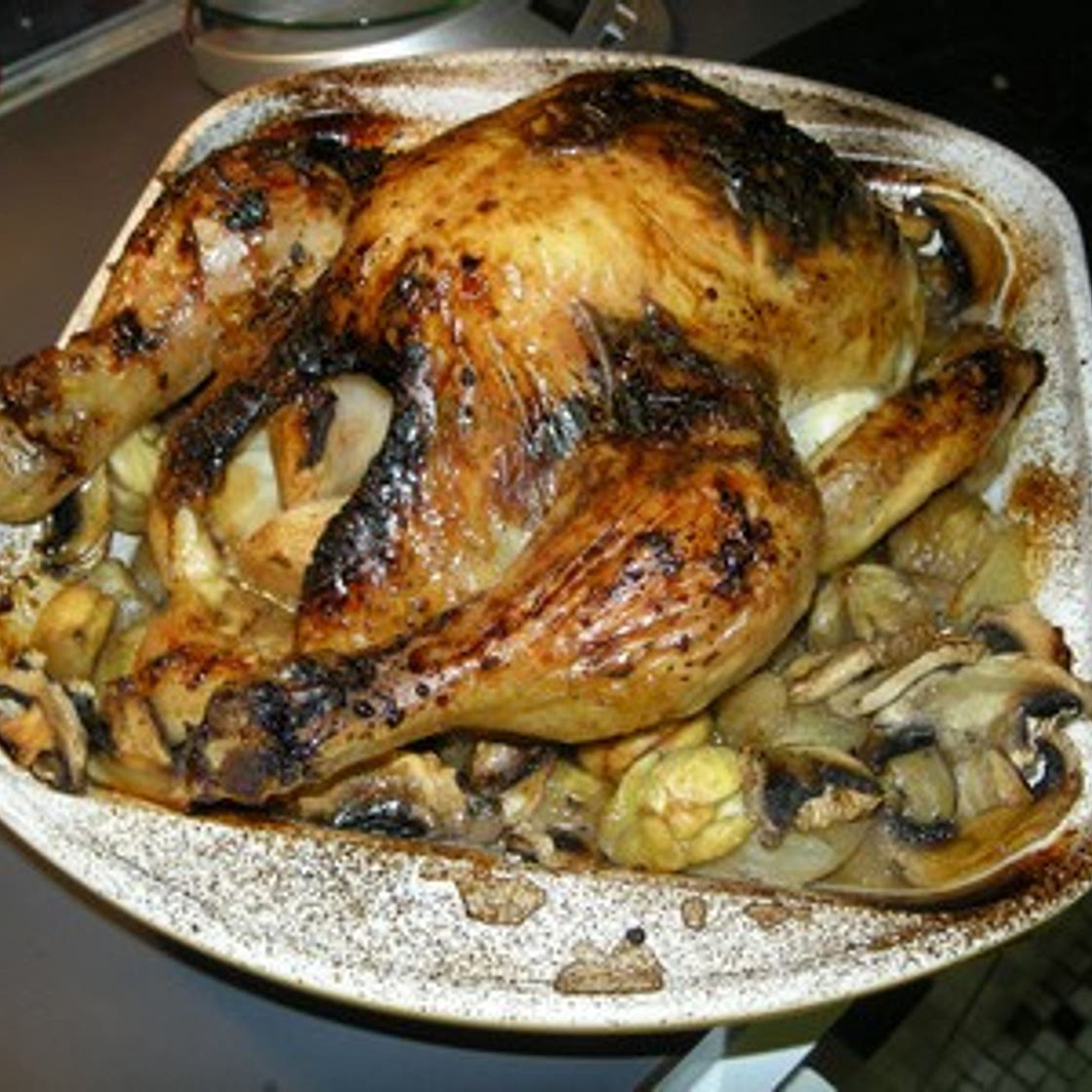 Poulet farci aux poires sur lit de marrons