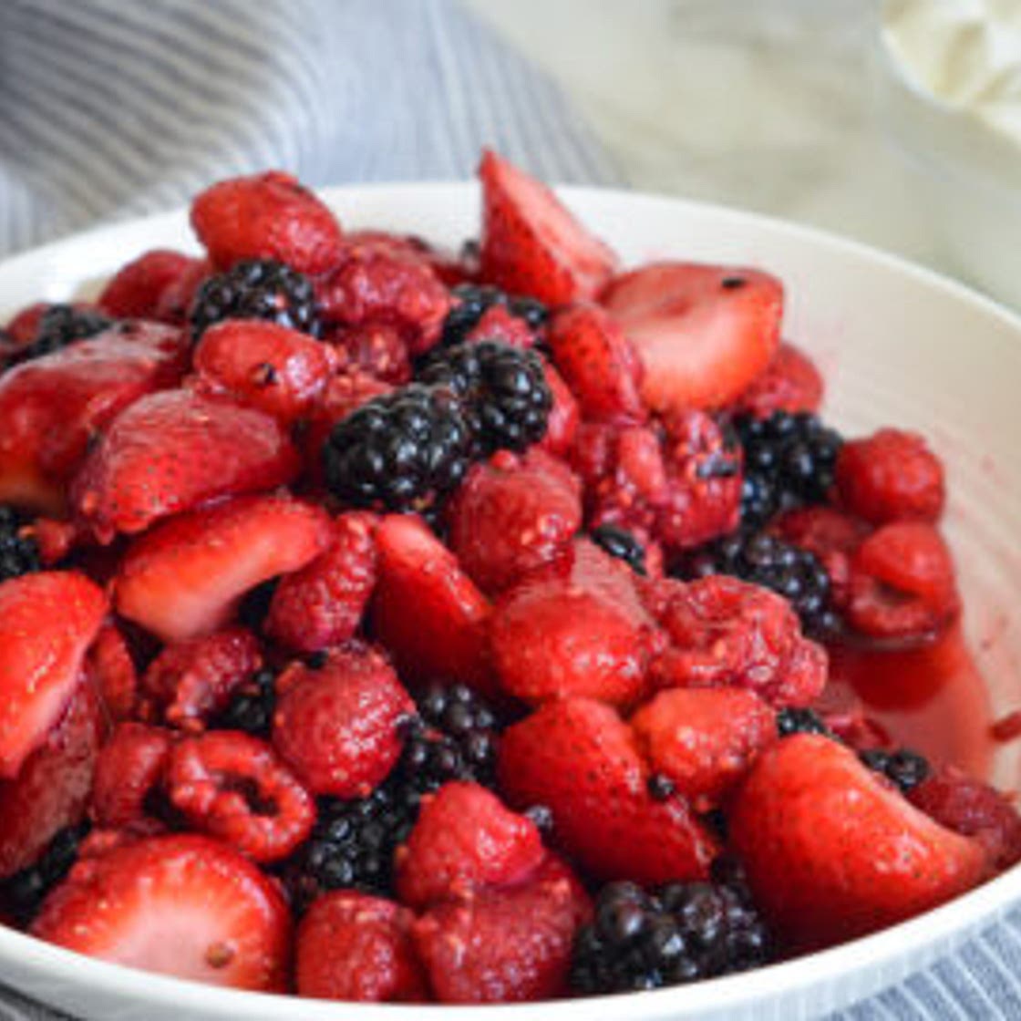 Gina Homolka's Macerated Berries with Greek Yogurt Whipped Cream