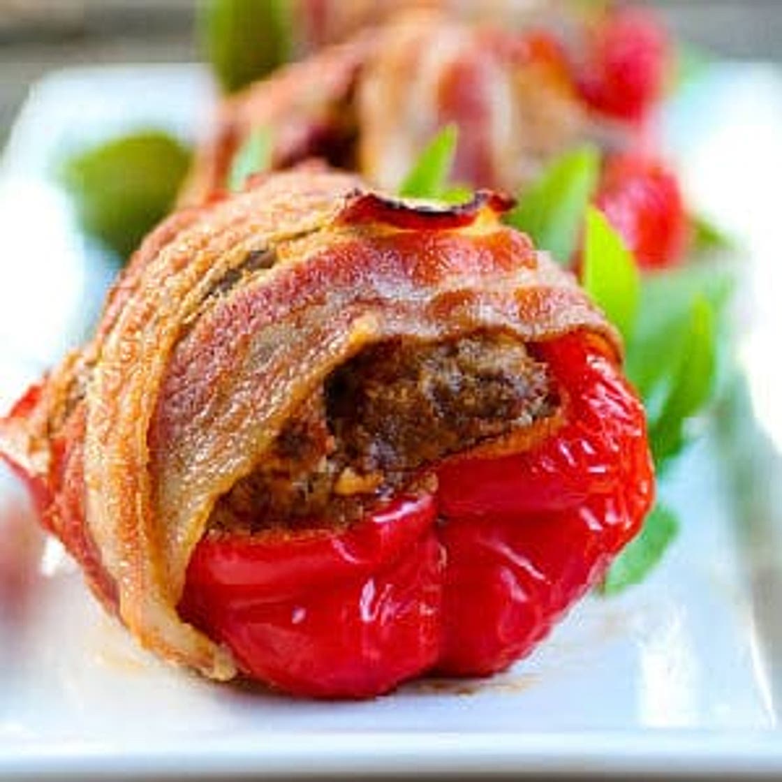 Meatloaf Stuffed Bell Peppers Wrapped in Bacon