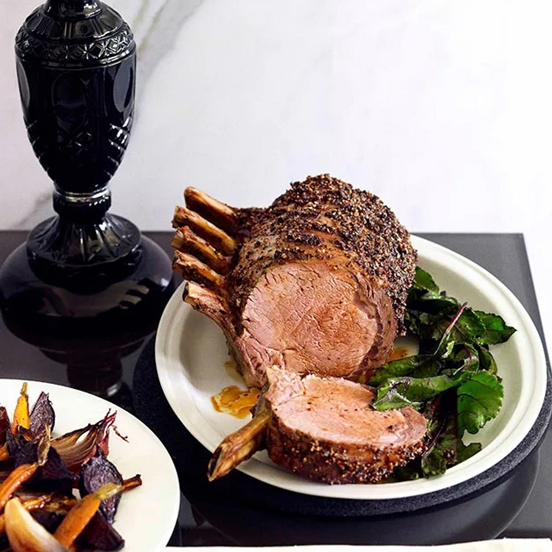 Pepper-crusted beef rib with beetroot and wilted beetroot greens