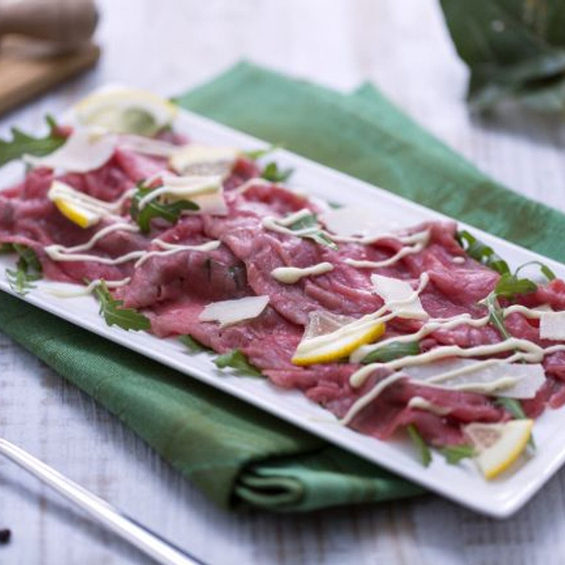 Carpaccio di manzo con rucola e grana