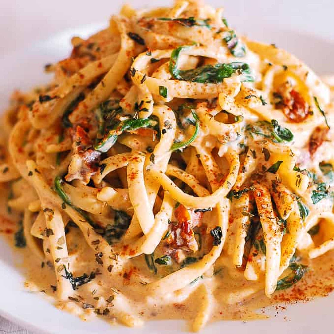 Linguine with spinach and sun-dried tomato cream sauce