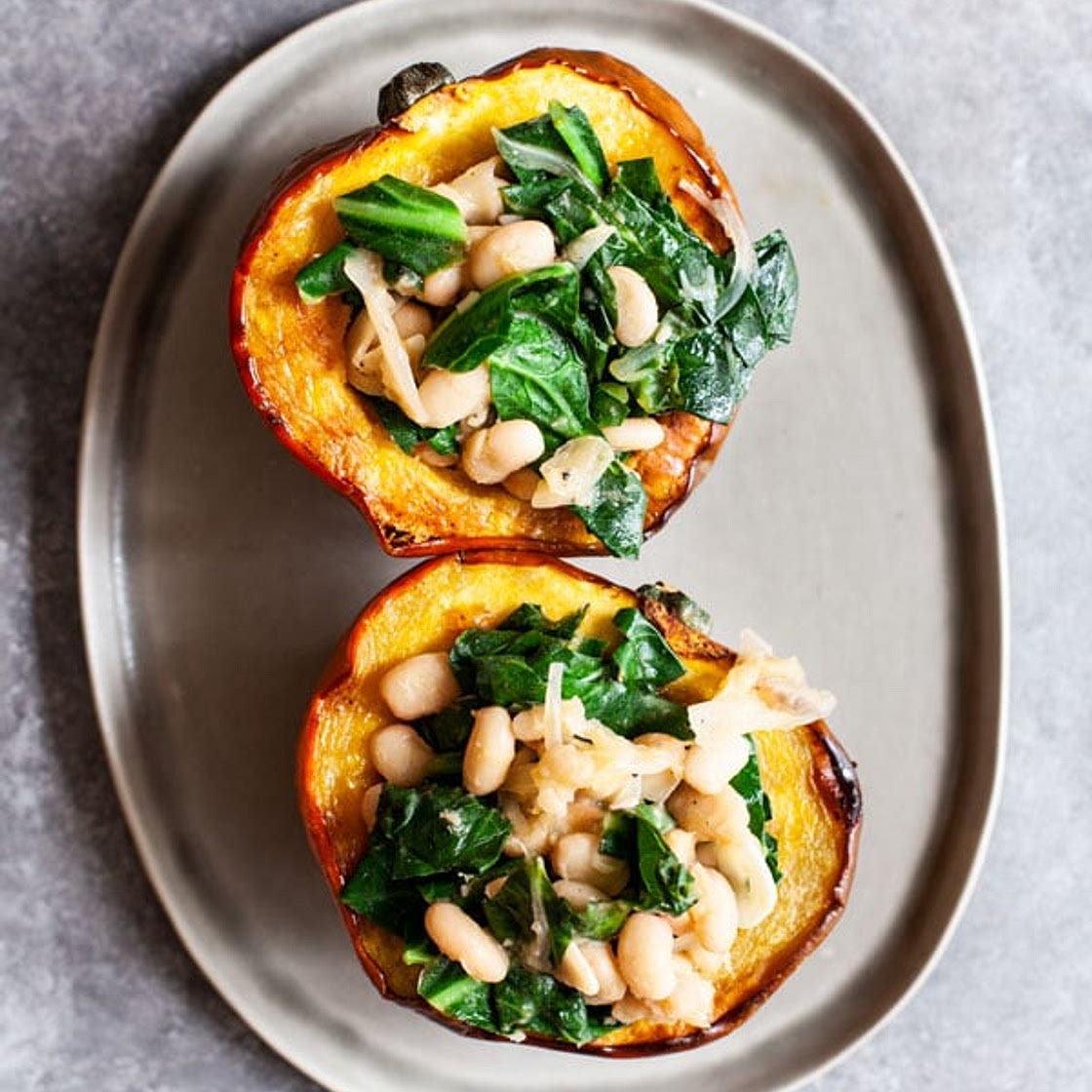 Stuffed Acorn Squash with Garlicky Beans & Greens