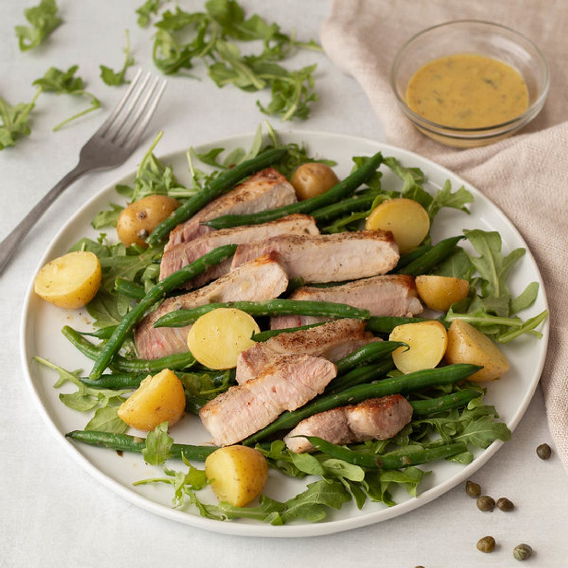 Dijon-Caper Potato Salad with Pork Chops & Green Beans