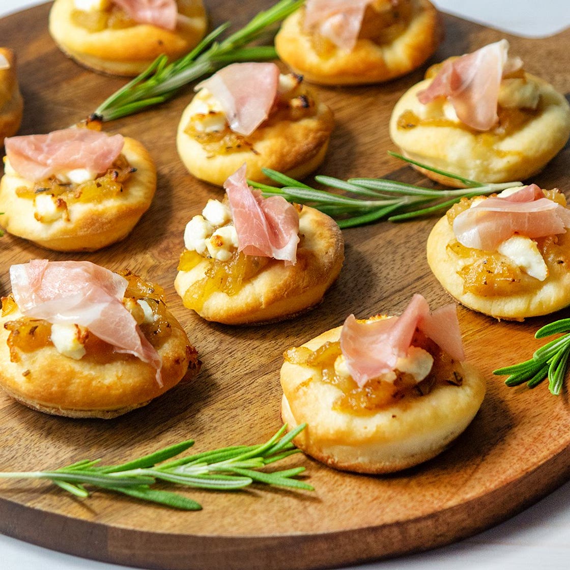 Caramelized Onion and Prosciutto Pizzettes