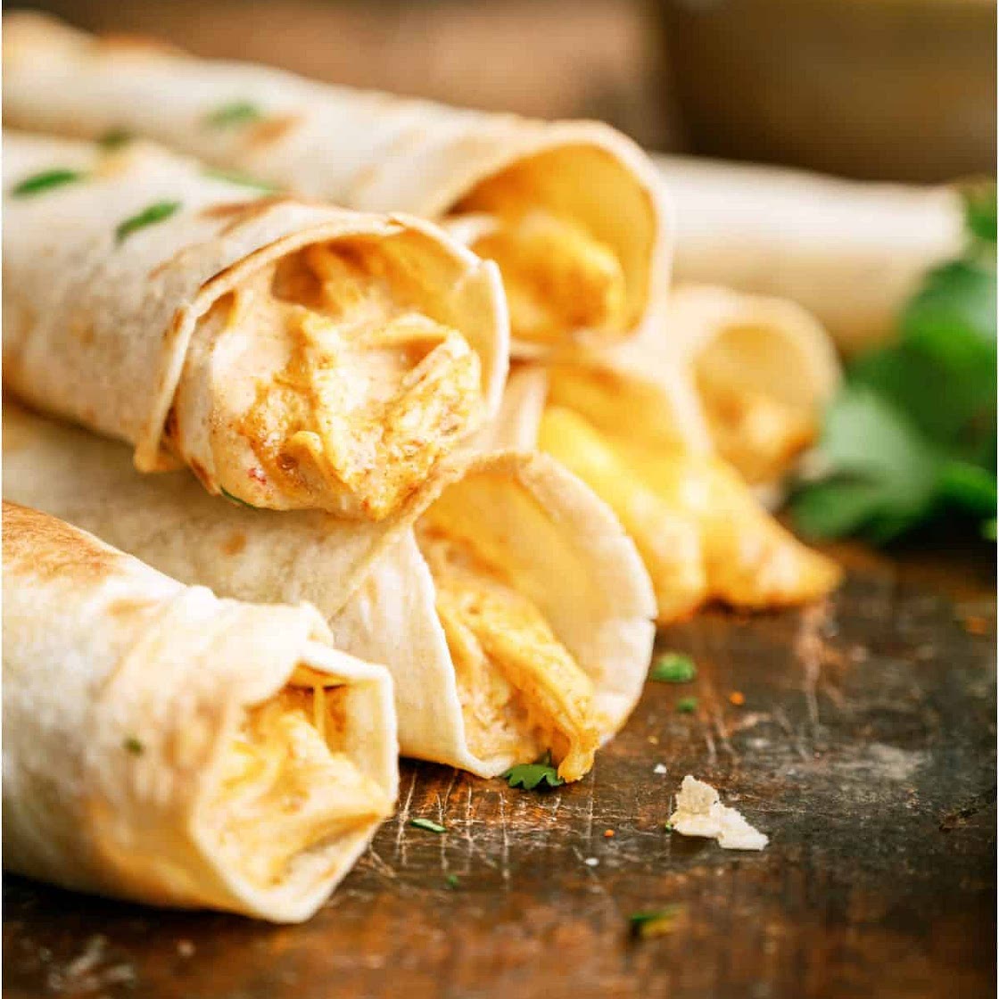 Slow Cooker Cheesy Chicken Taquitos
