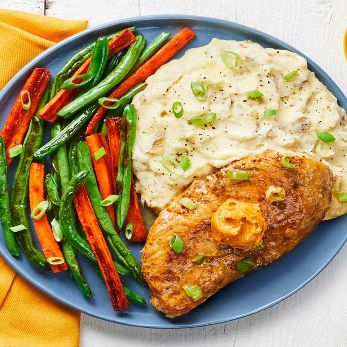 Old Bay Buttered-Up Chicken with Garlic Mashed Potatoes & Roasted Veggies