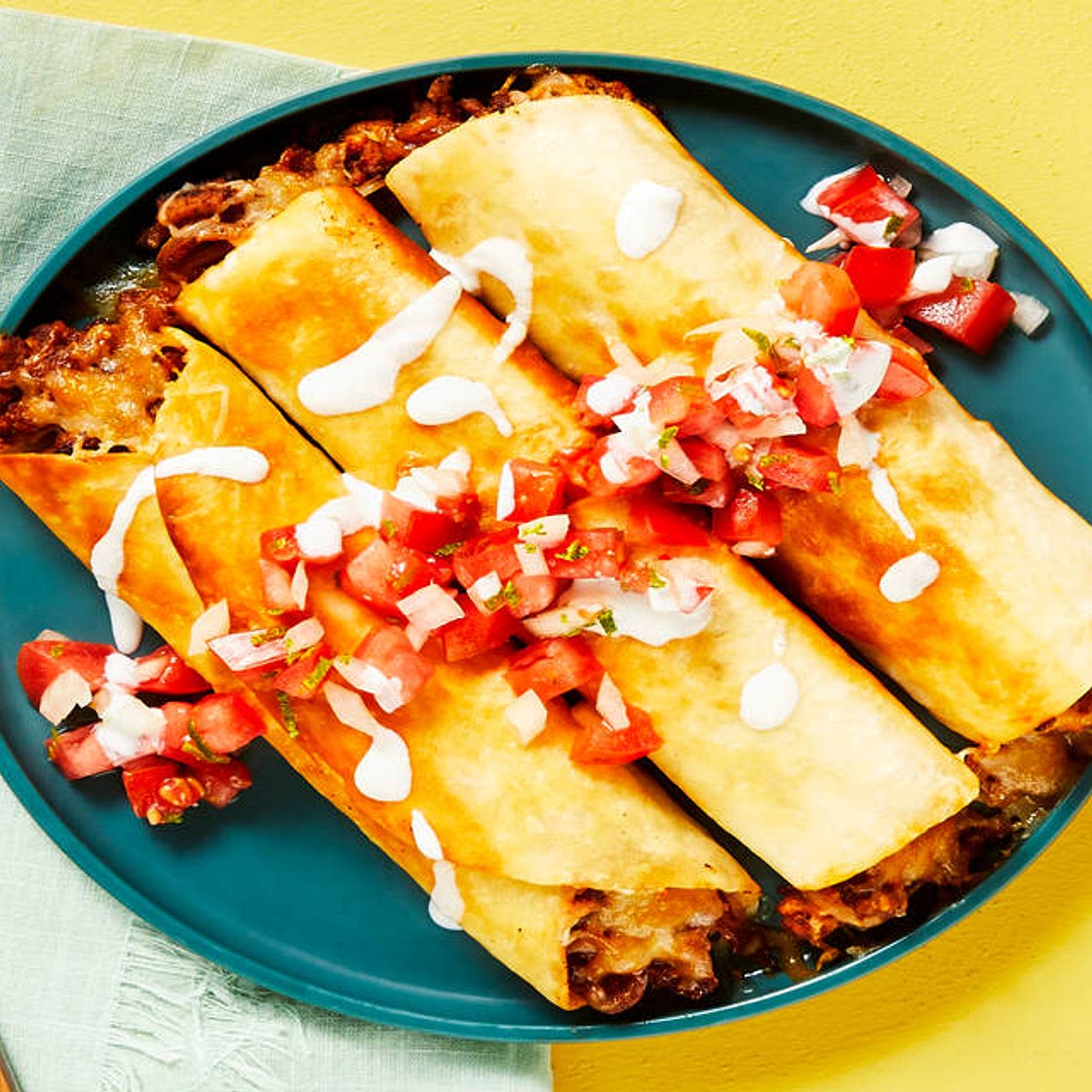 Beef Flautas Supreme with Pico de Gallo & Lime Crema