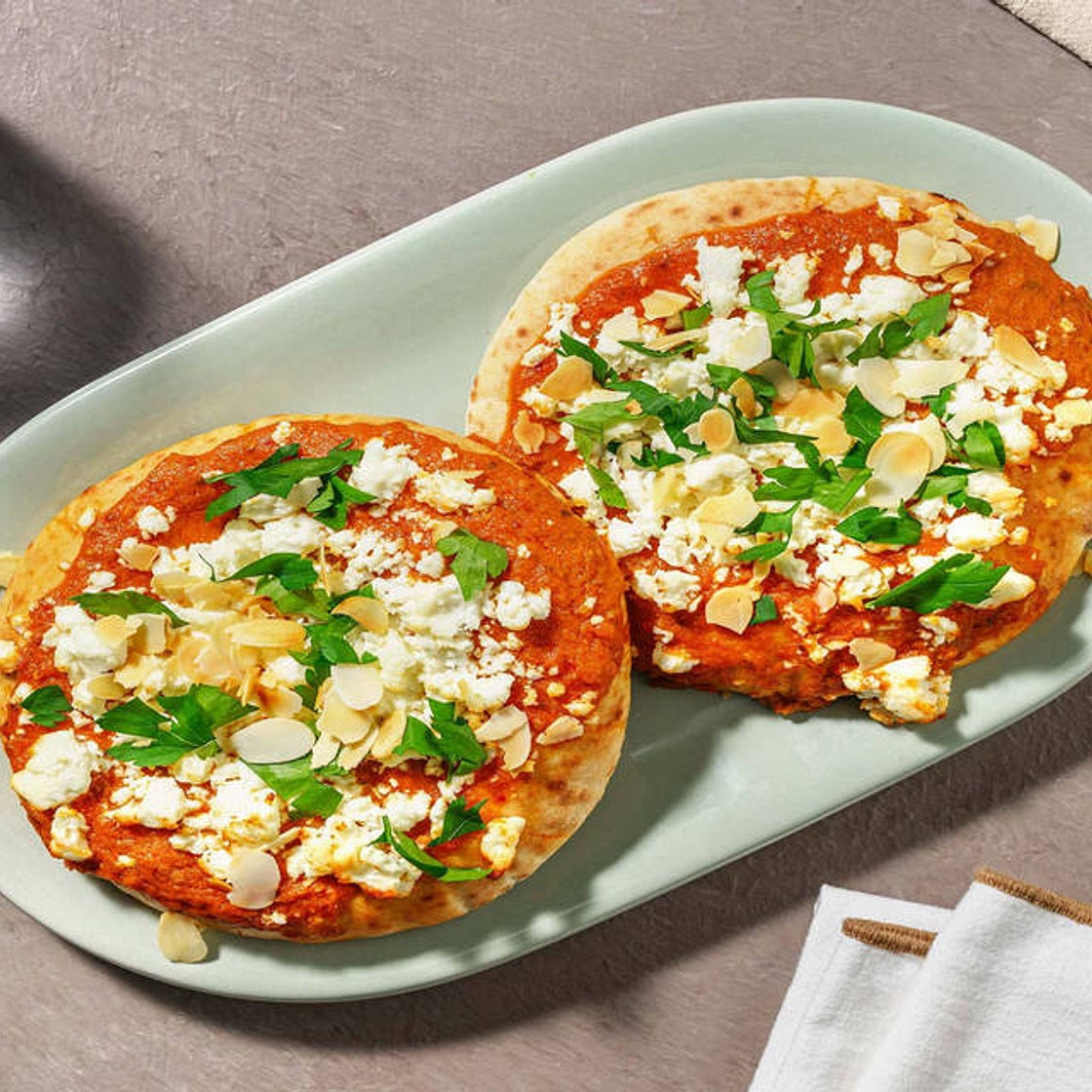 Loaded Pizza Style Harissa Flatbreads with Greek Style Cheese and Flaked Almonds | Perfect for sharing