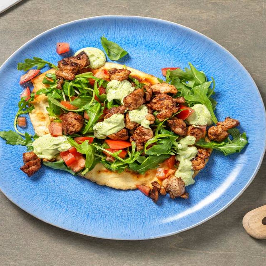 Chermoula Chicken Loaded Naan with Zhoug Yoghurt, Rocket and Tomato