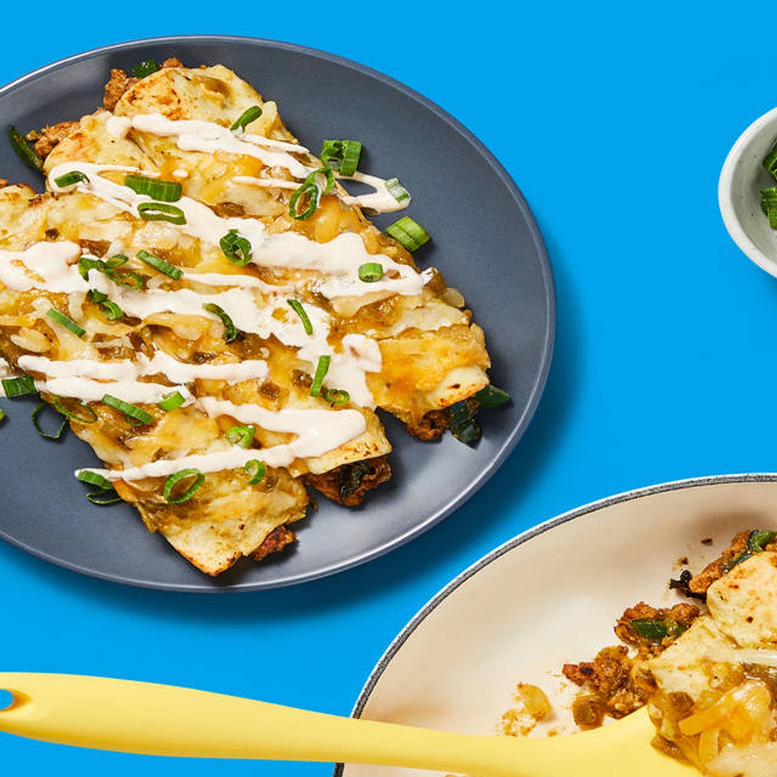 One-Pan Beef Enchiladas Verdes with Mexican Cheese & Hot Sauce Crema