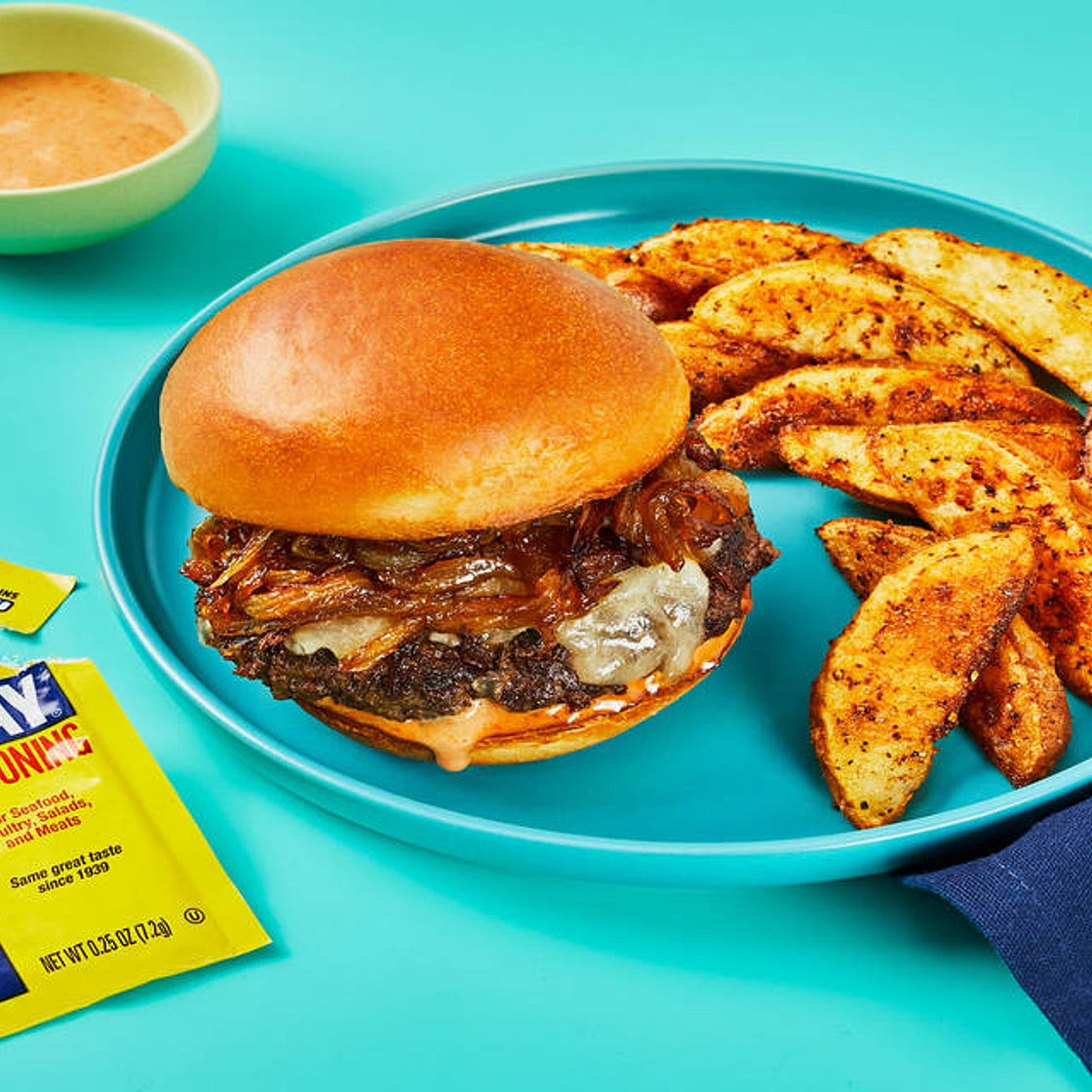 Cheddar Wonderburgers & OLD BAY® Fries with Caramelized Onion & Special Sauce