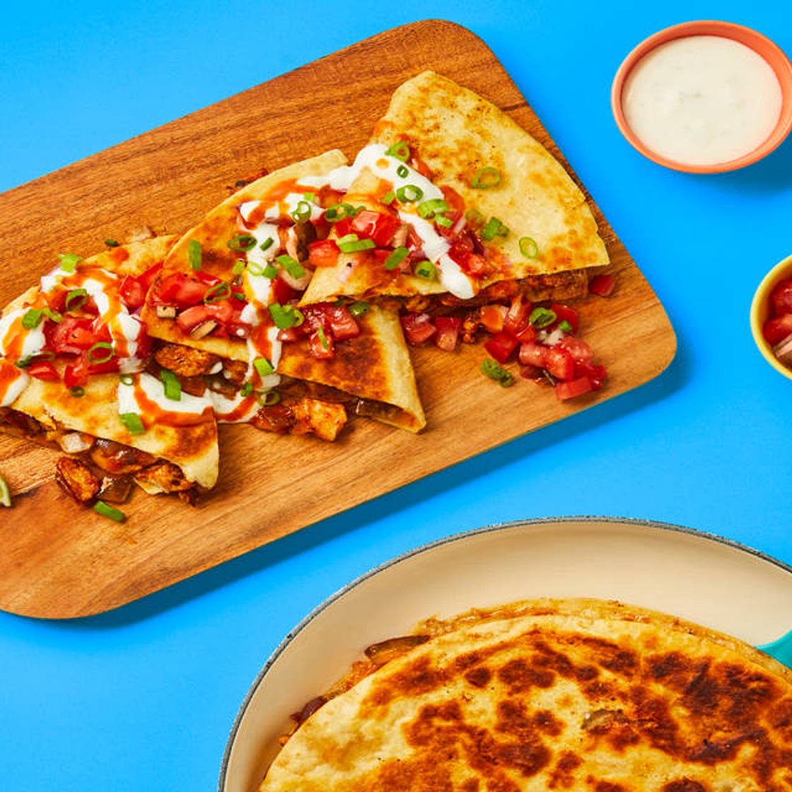 One-Pan Baja Chicken Quesadillas with Chicken Thighs, Salsa Fresca, Lime Crema & Hot Sauce