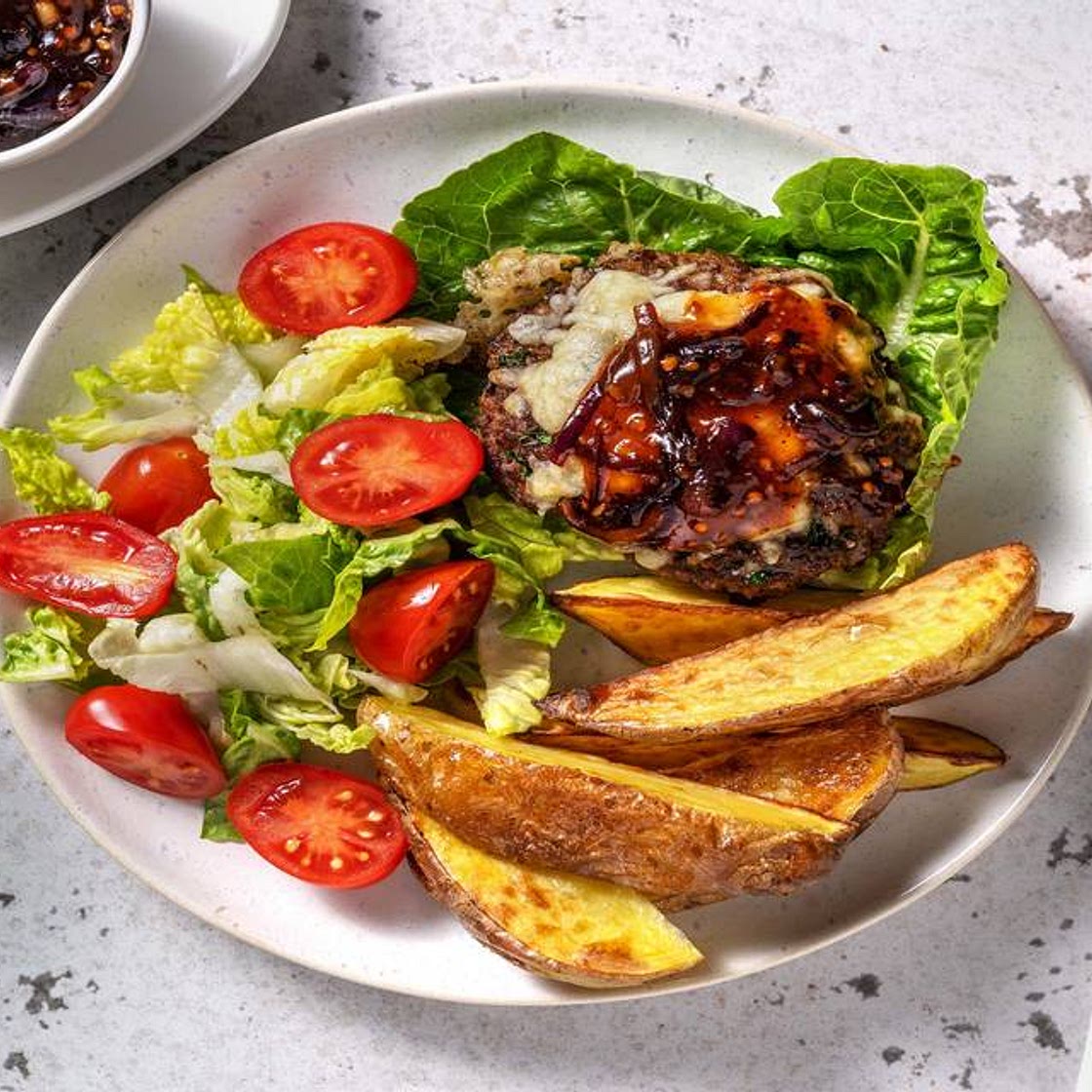 Cheesy Mexican Style Spiced Naked Burger with Wedges, Baby Gem Salad and Onion Relish