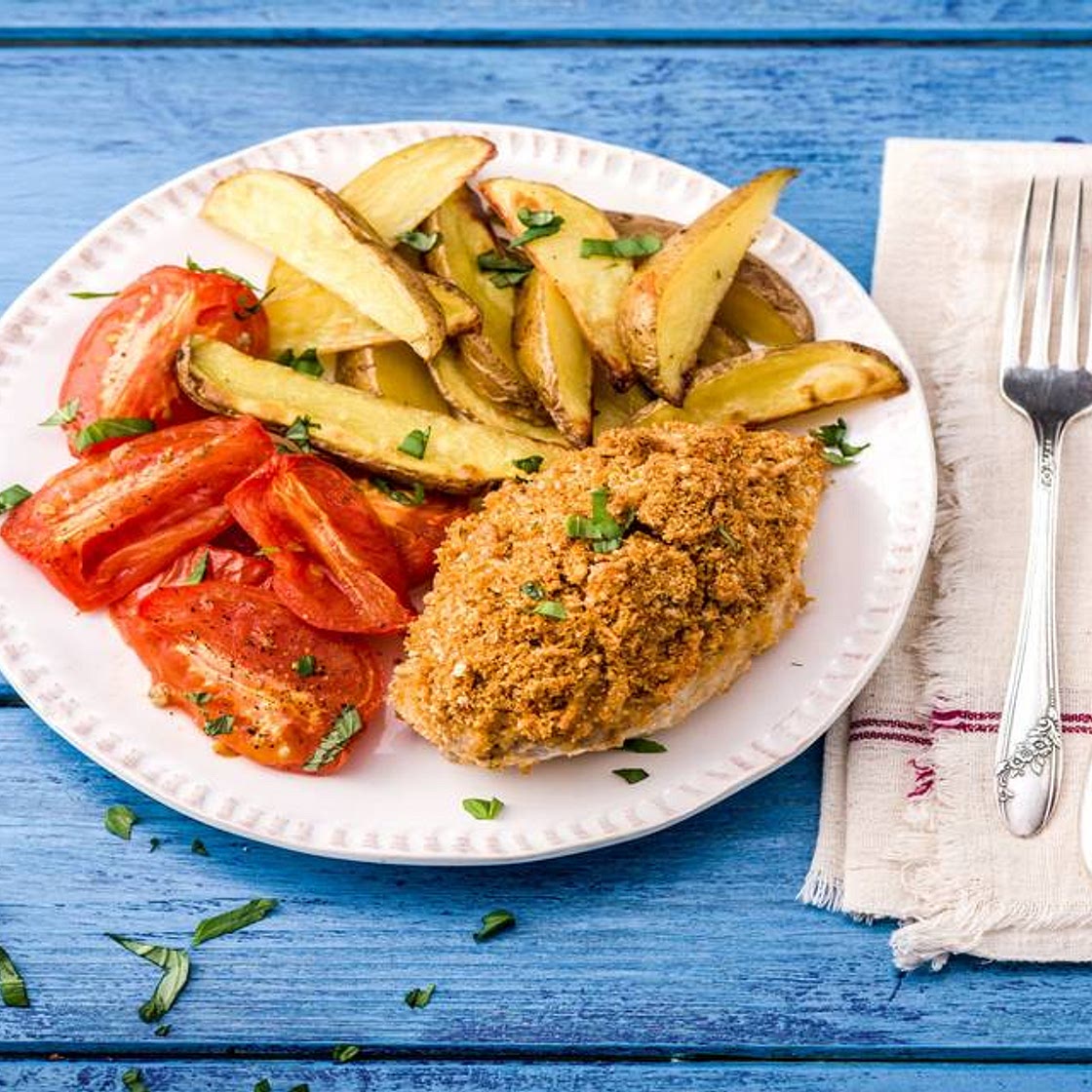 Mozzarella-Crusted Chicken with Blistered Tomatoes and Potato Wedges