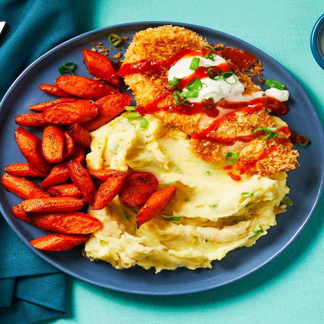 Crispy Buffalo-Spiced Chicken with Blue Cheese Sauce, Scallion Mashed Potatoes & Roasted Carrots