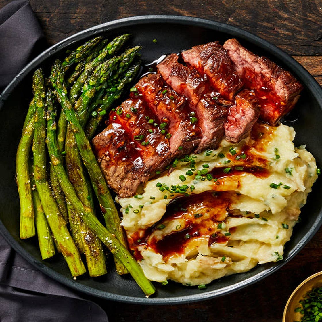 Bavette Steak & Roasted Garlic Pan Sauce with Mashed Potatoes & Asparagus