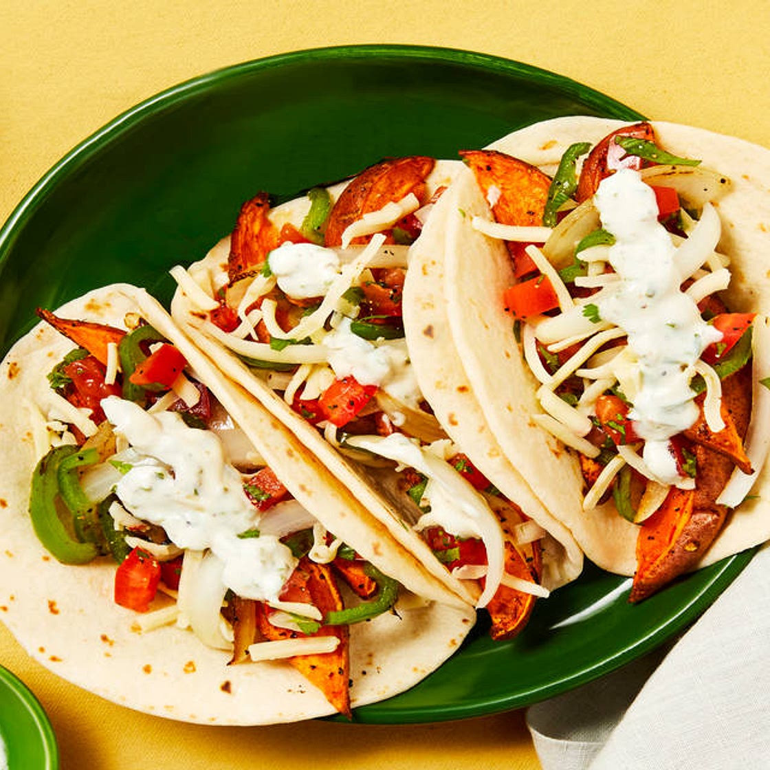 Sweet Potato Fajitas with Pepper Jack, Pickled Onion & Lime Crema