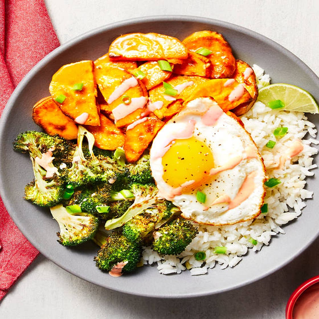 Honey Miso Broccoli Donburi with Sweet Potato, Fried Eggs, Scallion Rice & Sriracha Mayo