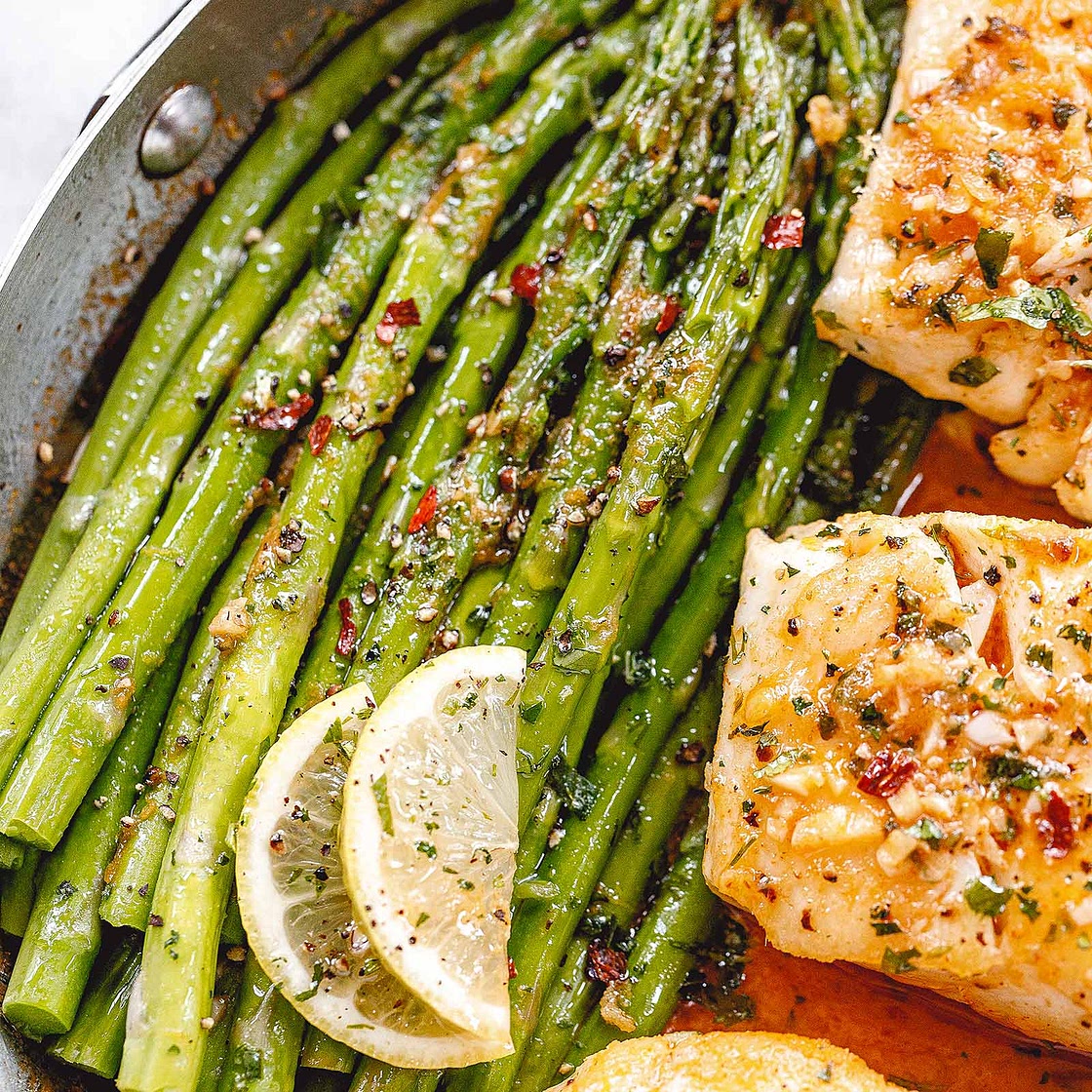 Garlic Butter Cod with Lemon Asparagus Skillet