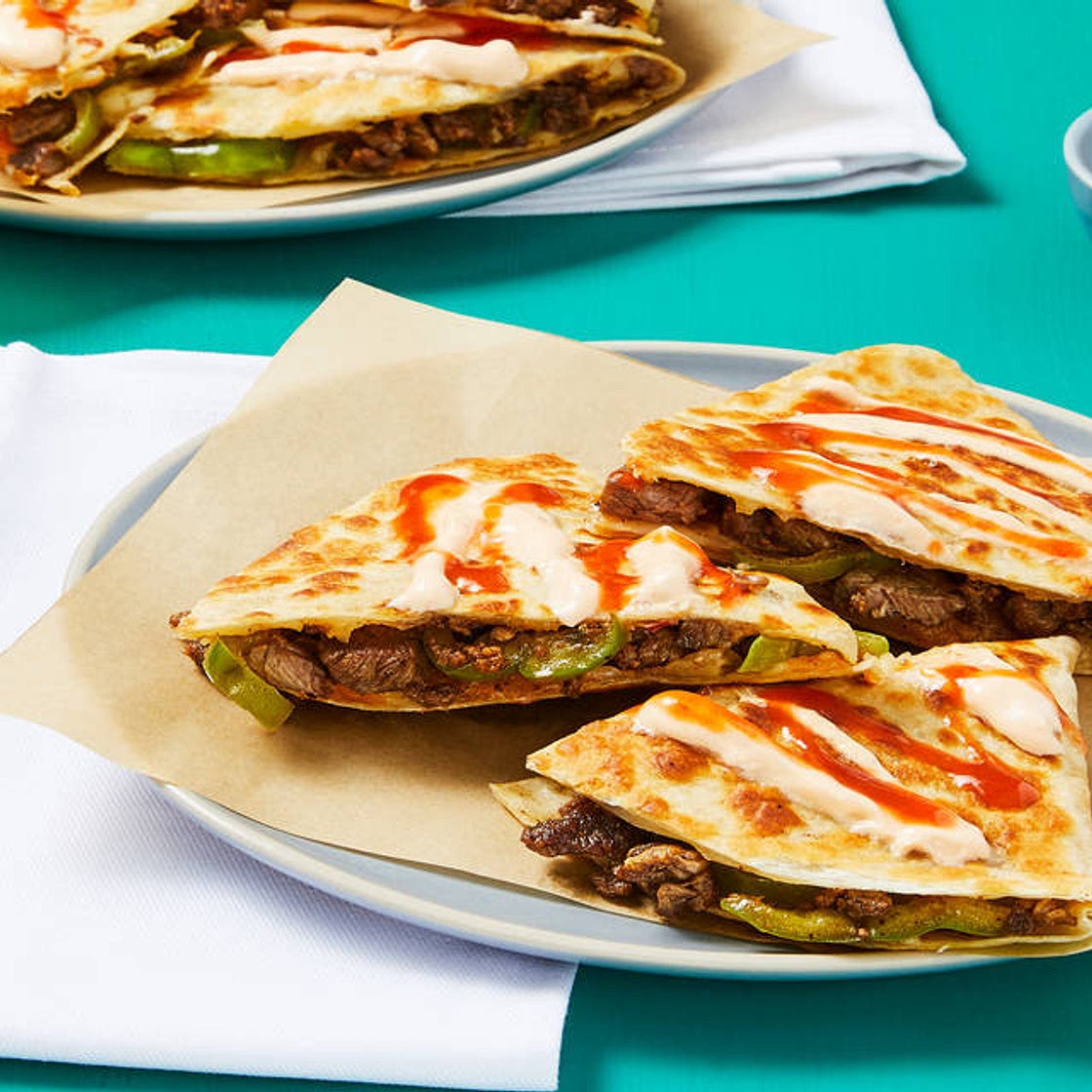 One-Pan Steak & Green Pepper Quesadillas with Hot Sauce & Smoky Red Pepper Crema