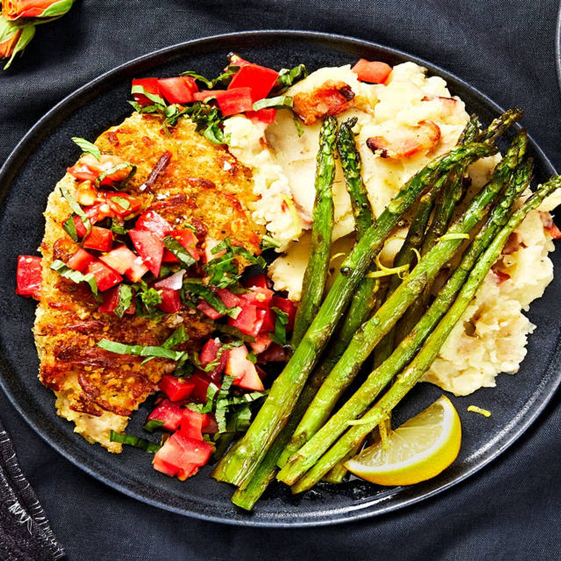 Bruschetta Chicken with a Crispy Mozzarella Crust, Bacon Mashed Potatoes, and Asparagus