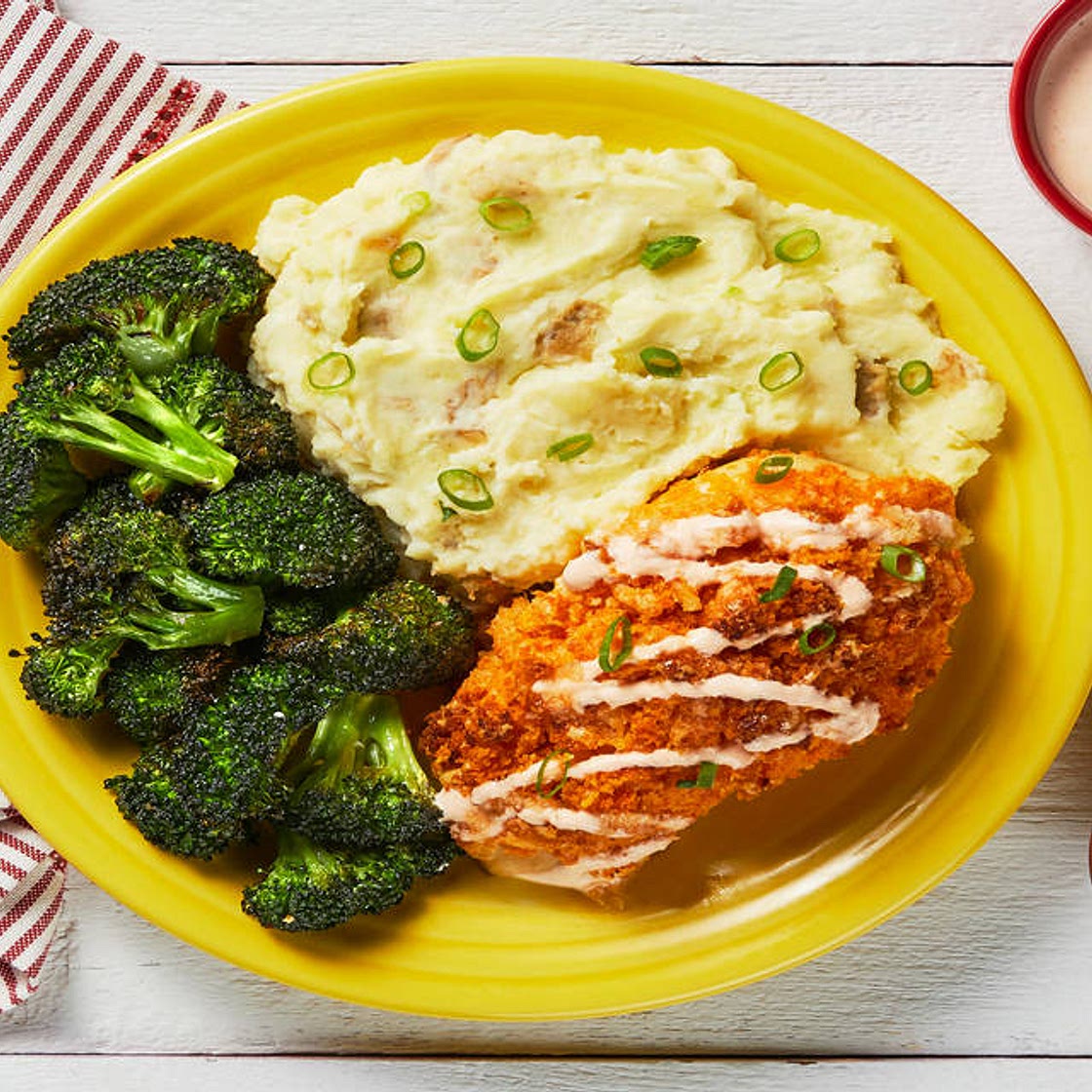 Crispy Kickin' Cayenne Chicken Cutlets with Monterey Jack, Mashed Potatoes, Buttery Broccoli & a Honey Drizzle