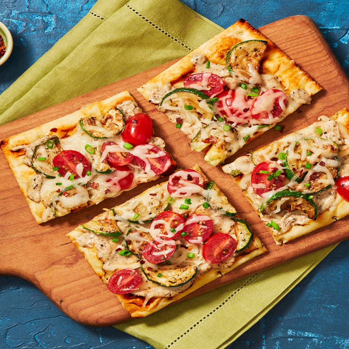 Roasted Garlic, Zucchini & Bacon Flatbreads with White Sauce, Mozzarella & Grape Tomatoes