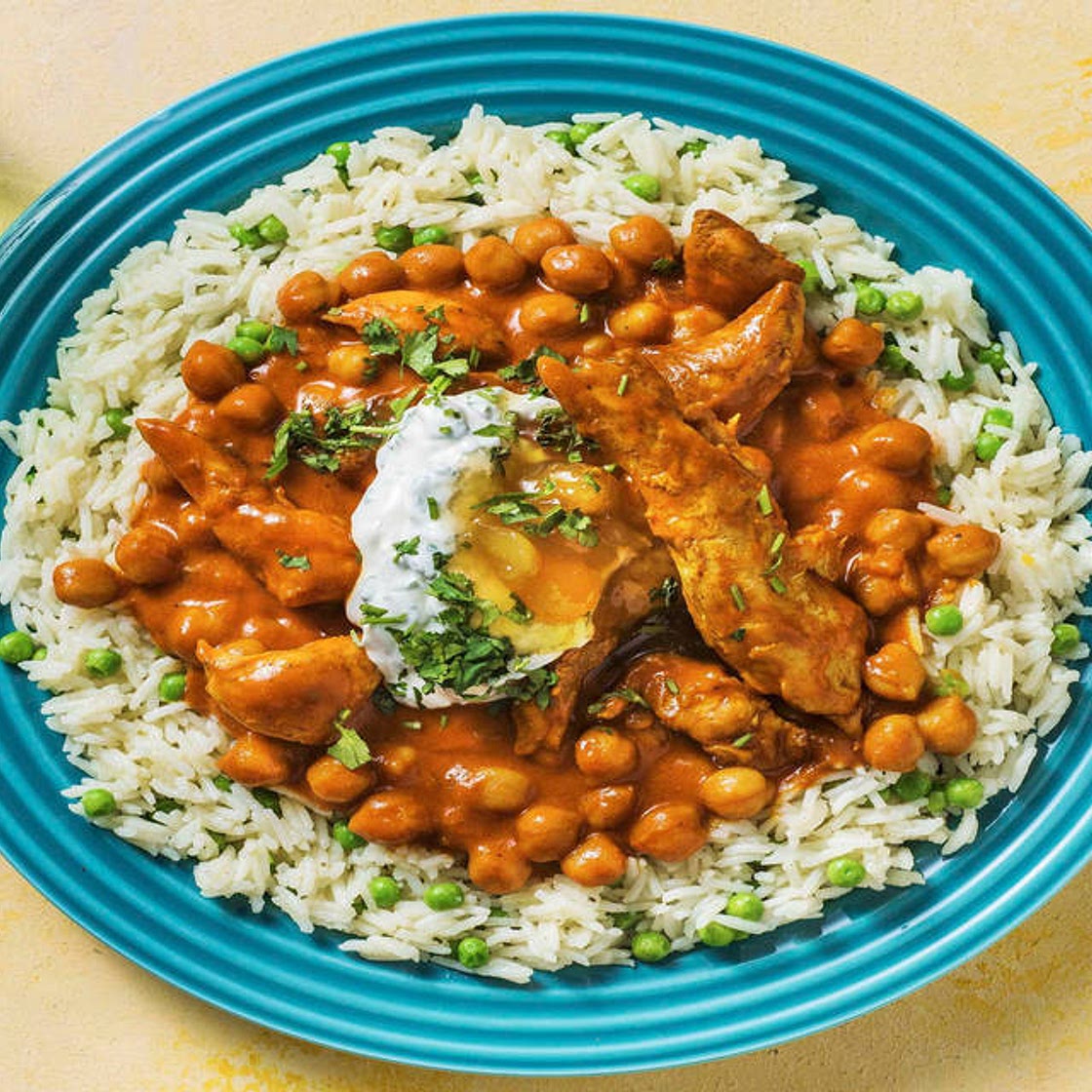 Indian Chicken and Chickpea Curry on Buttery Pilau Rice with Yogurt and Mango Chutney