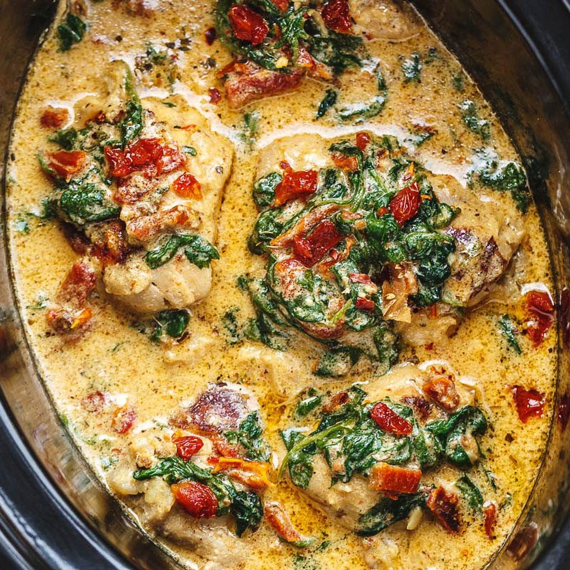 CrockPot Tuscan Garlic Chicken Thighs With Spinach and Sun-Dried Tomatoes