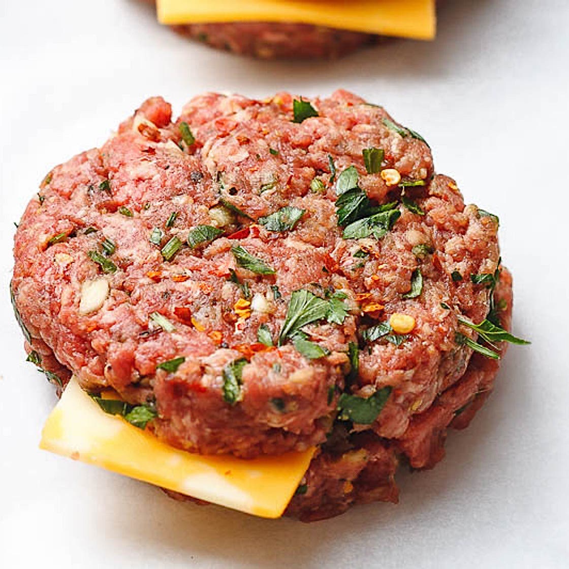 Cheesy Garlic Burgers with Lemon Butter Zucchini Noodles