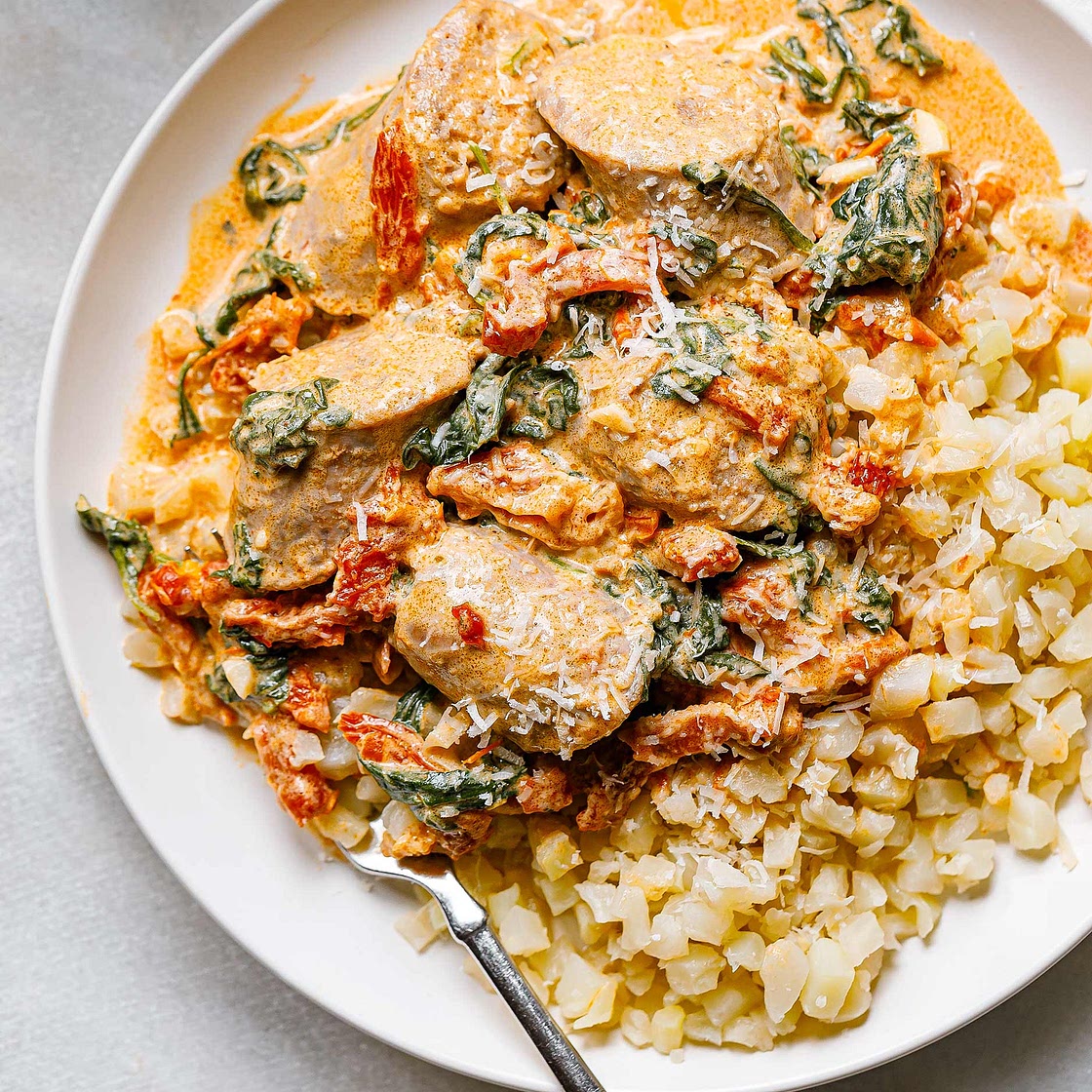 CrockPot Tuscan Sausage With Spinach and Sun-Dried Tomatoes