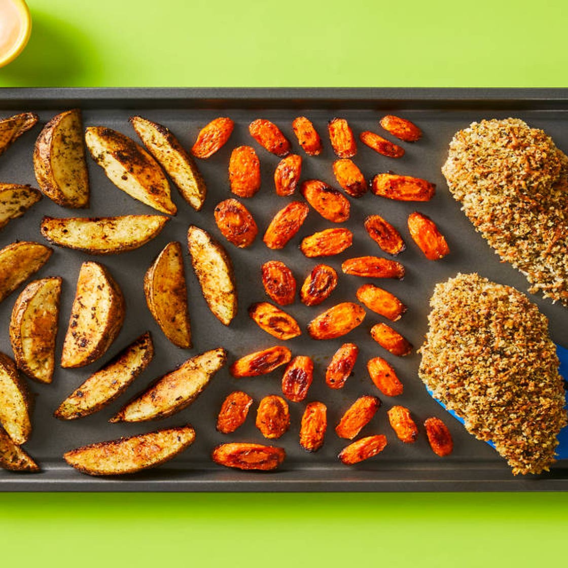 Sheet Pan Monterey Jack Un-Fried Chicken with Roasted Broccoli, Potato Wedges & Sriracha Mayo