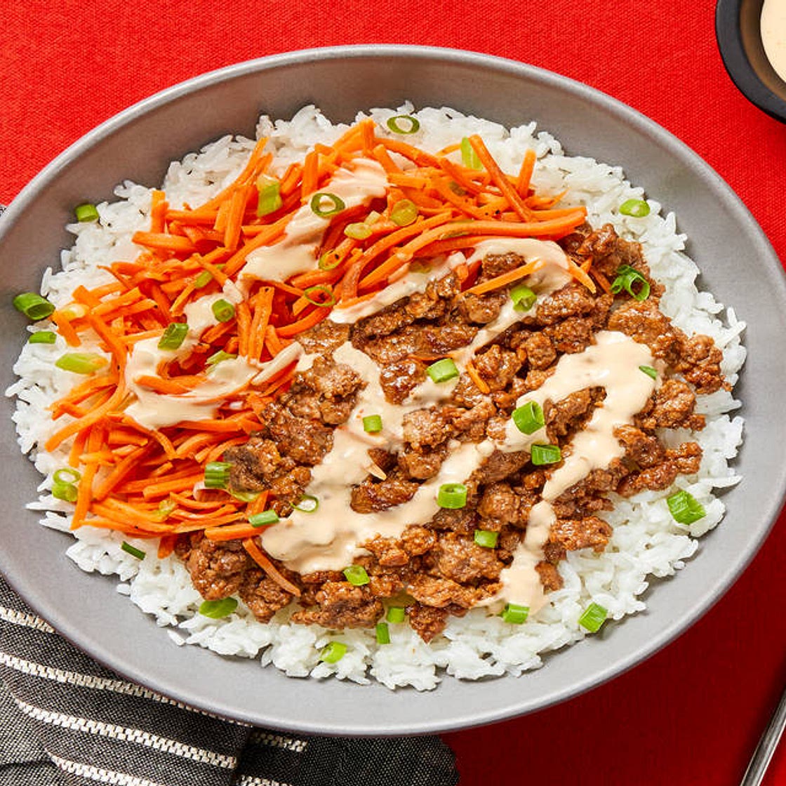Sesame Soy Beef Bowls with Carrots, Buttery Rice & Sriracha Mayo