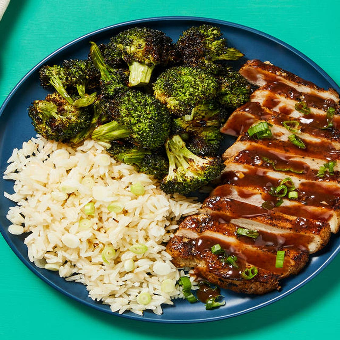 Hoisin Plum Pork Chops with Scallion Rice & Sesame Roasted Broccoli
