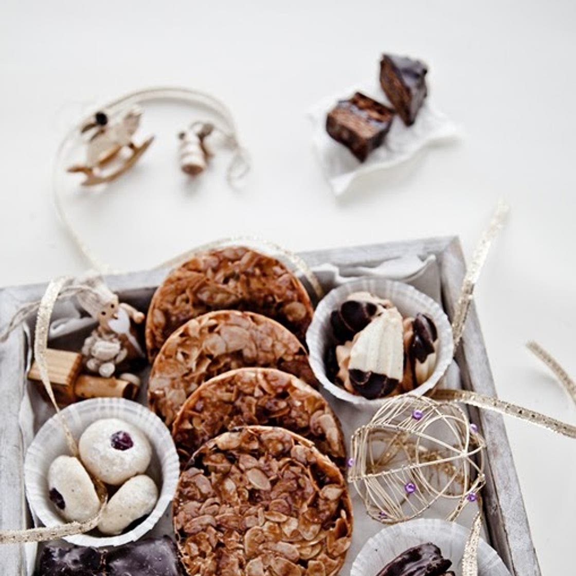 Christmas Cookies: Almond Peanut Florentines, Chocolate Brushed Lebkuchen and Hazelnut Gianduia Spritz Cookies