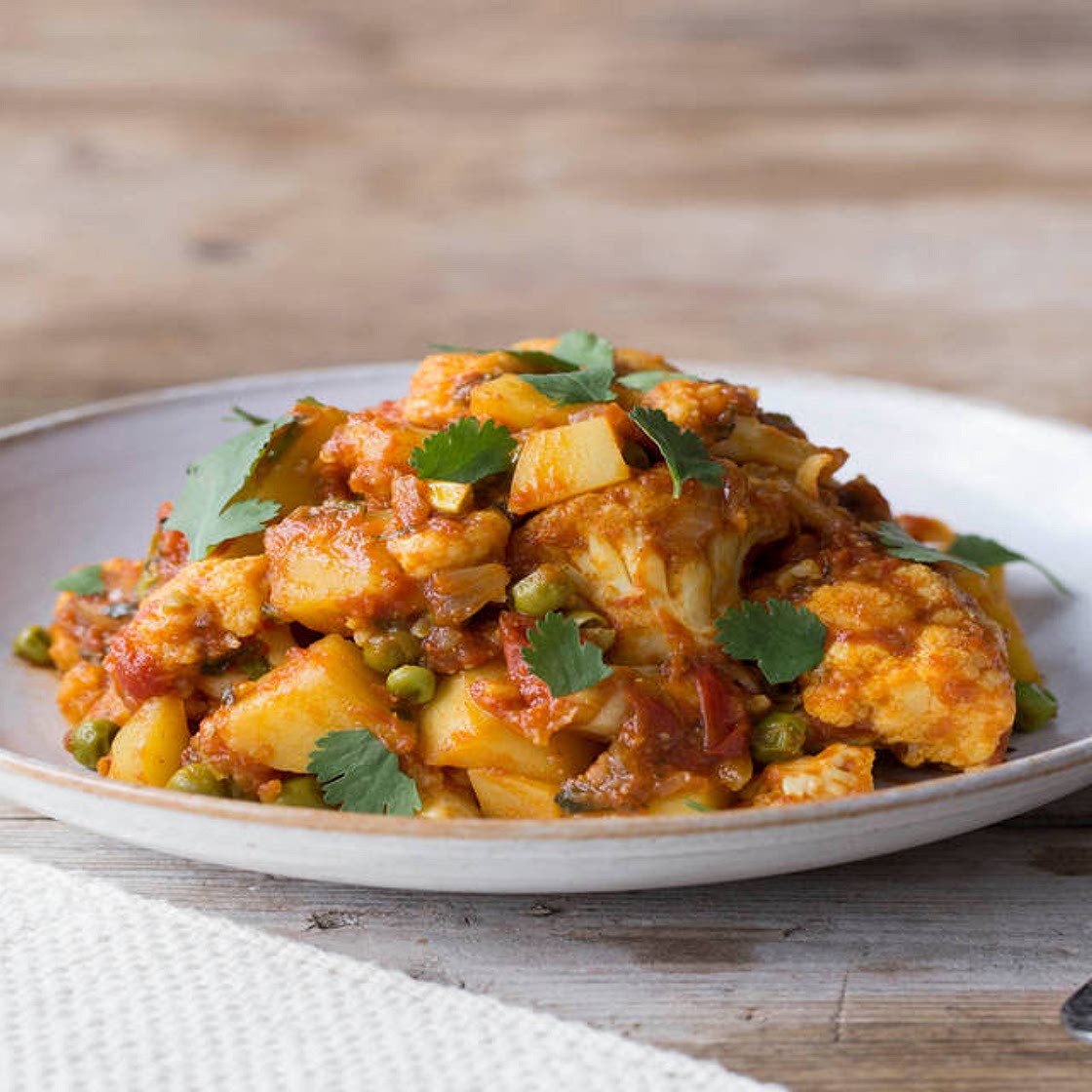 Curried Cauliflower & Potatoes with Green Peas
