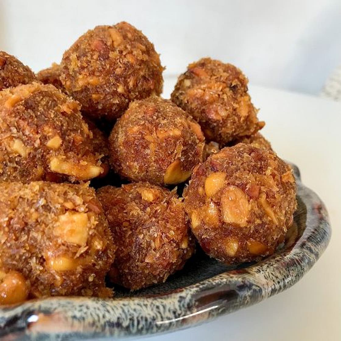 Extra nutty Cocadas (Caramelised Coconut balls with cashews)