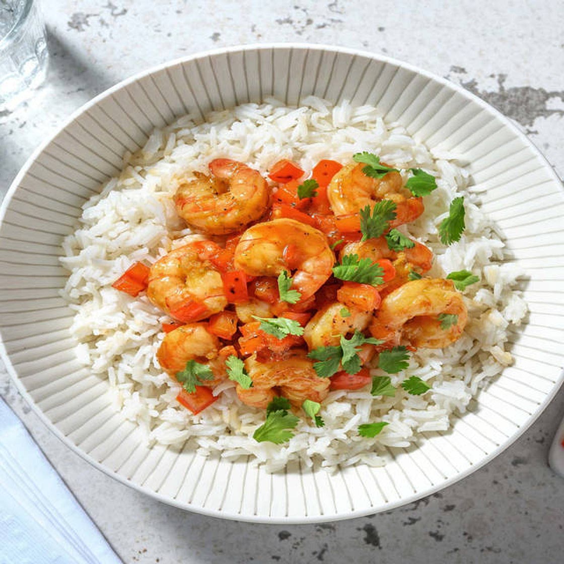 Crevettes sautées au miel & gingembre avec du poivron & du riz parfumé