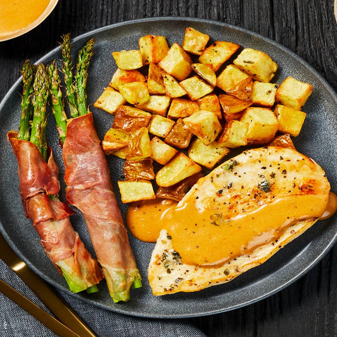 Buttery Garlic-Herb Chicken with Prosciutto-Wrapped Asparagus & Herbed Potatoes