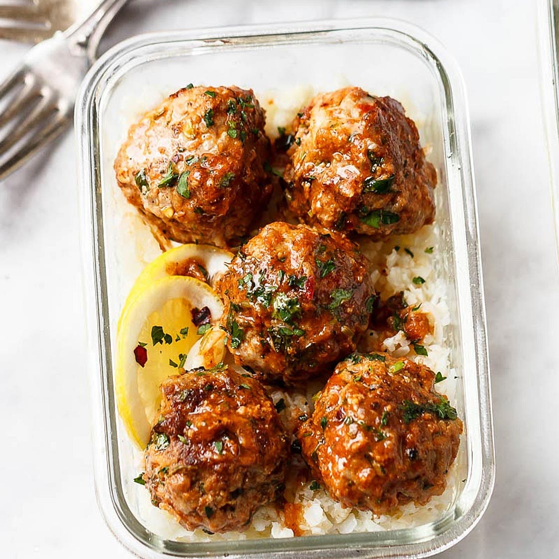 Meal Prep Garlic Butter Chicken Meatballs with Cauliflower Rice