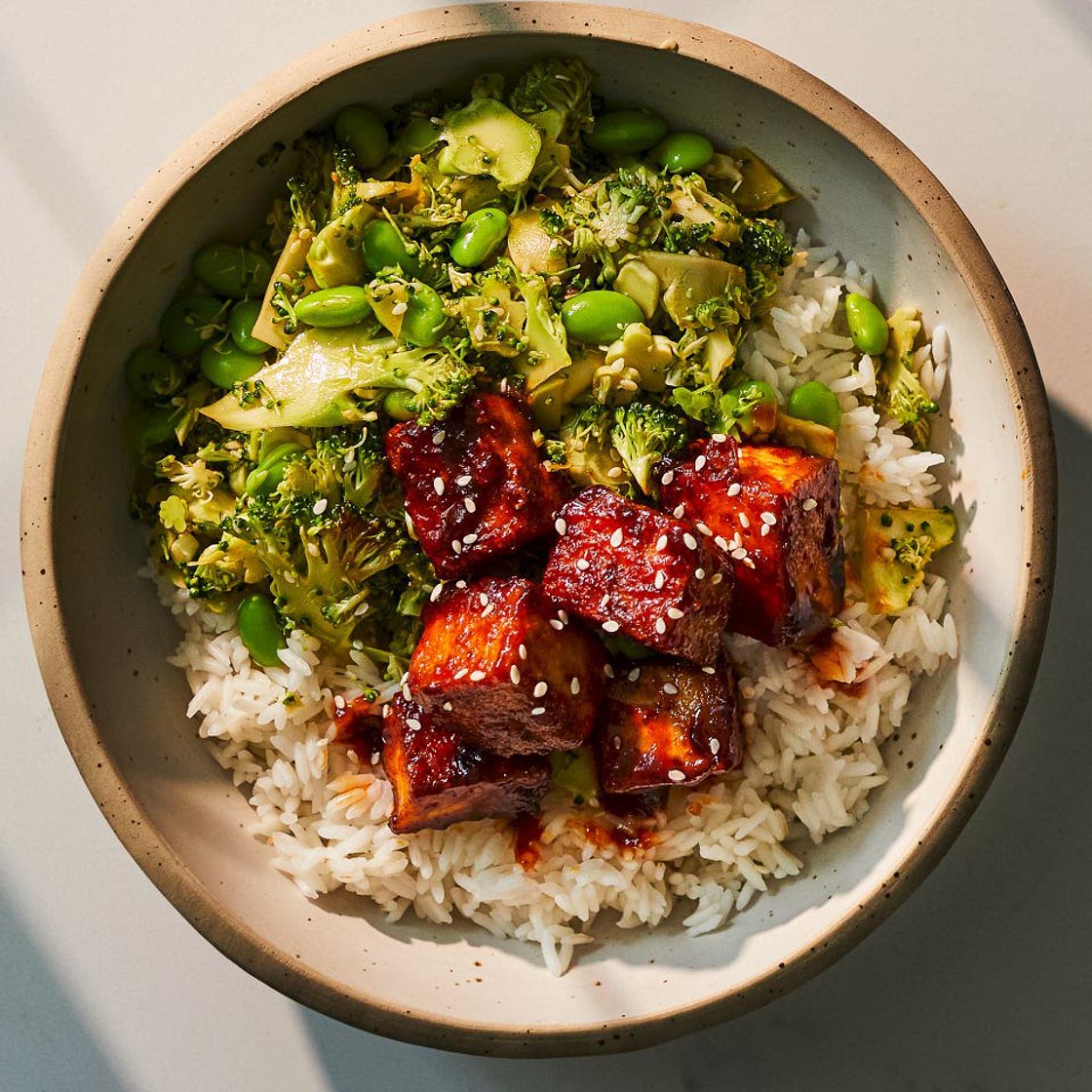 Sriracha tofu with shaved broccoli and edamame salad