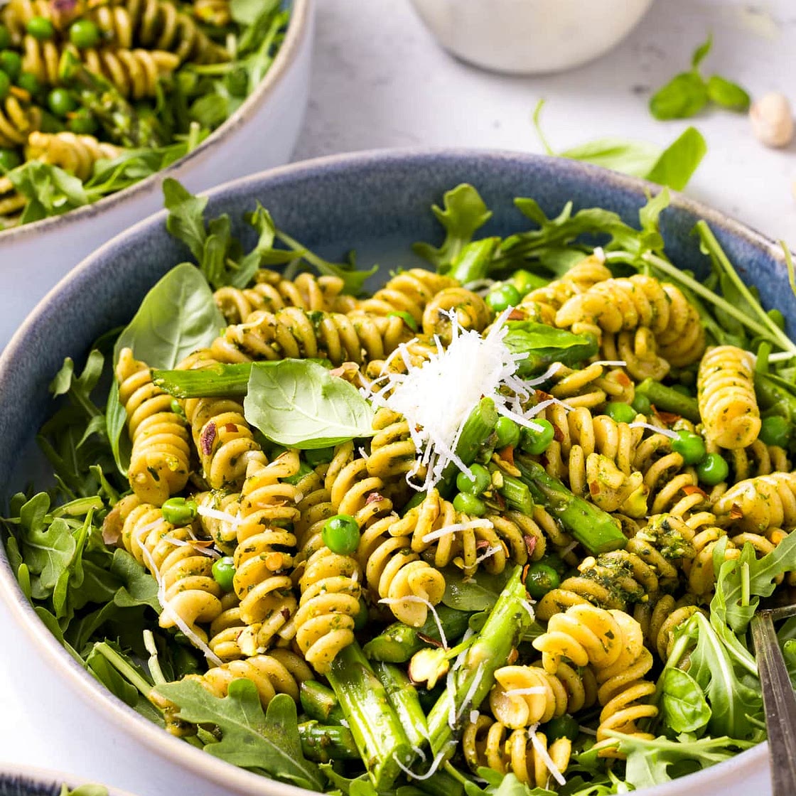 Pesto Pasta with Arugula, Asparagus, Peas, and Pistachios